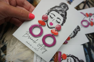 Color block (mauve, tangerine, grape with silver)