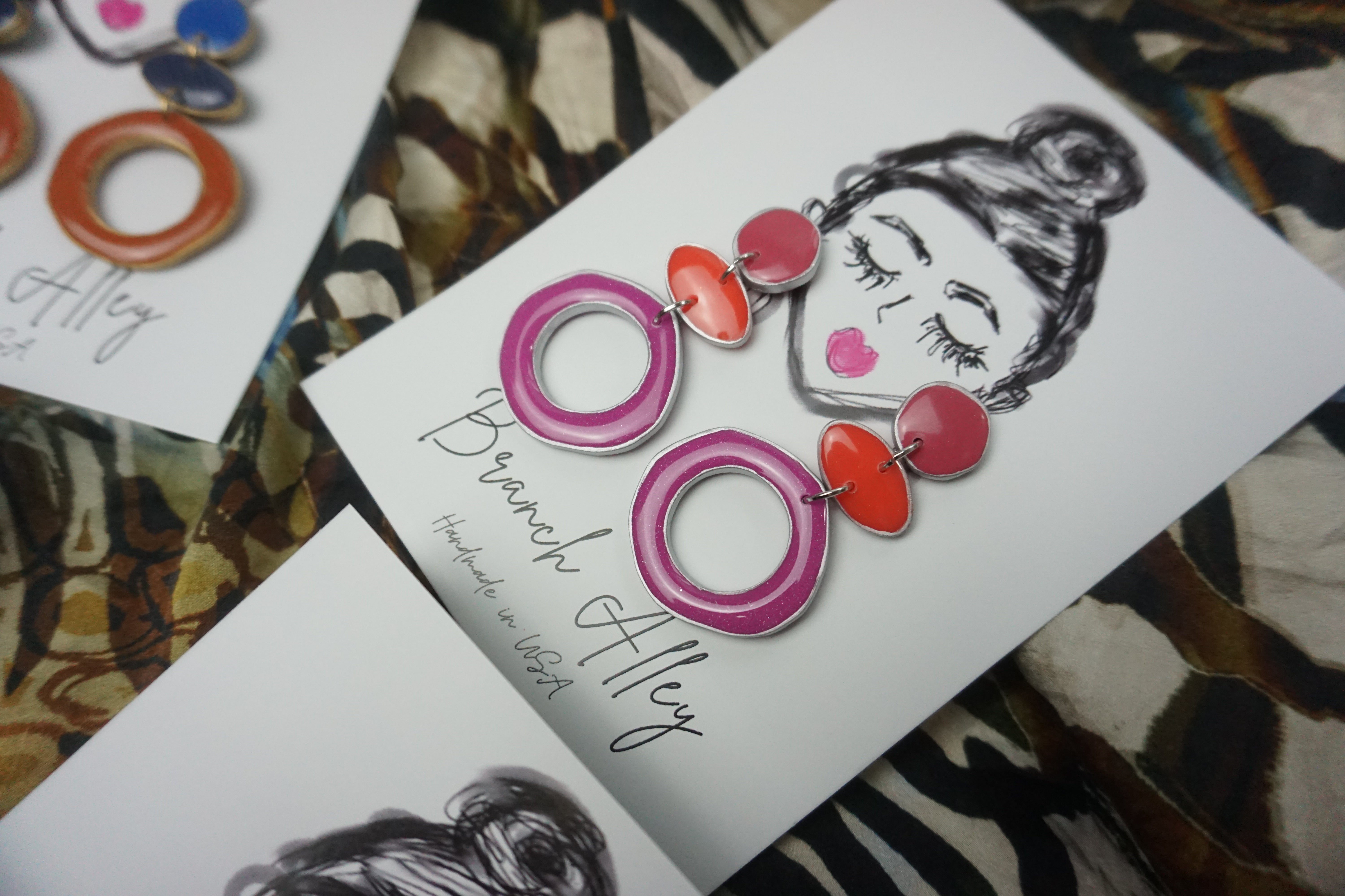 Color block (mauve, tangerine, grape with silver)